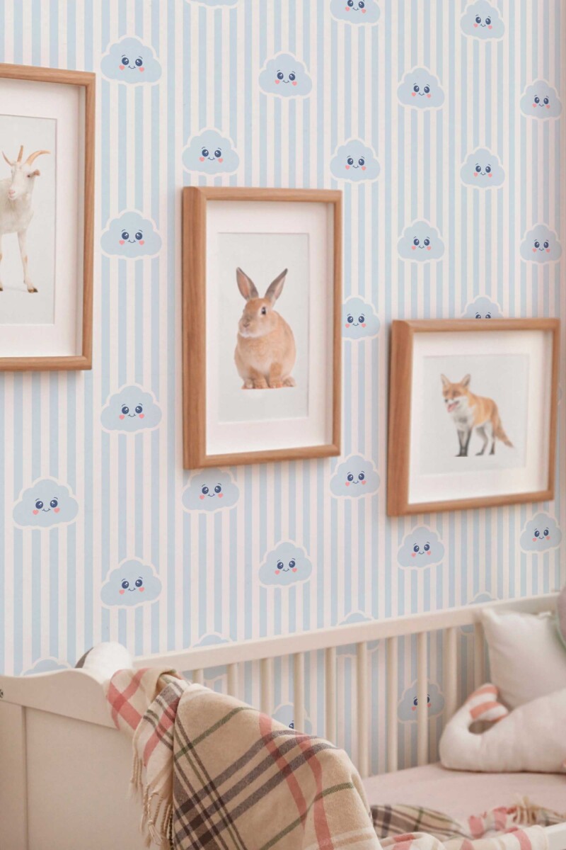 Fancy Walls traditional wallpaper with charming blue clouds and minimal stripes designed for a sweet and calming baby room. Cute Nursery Clouds removable PVC-free and eco-friendly wallpaper for walls