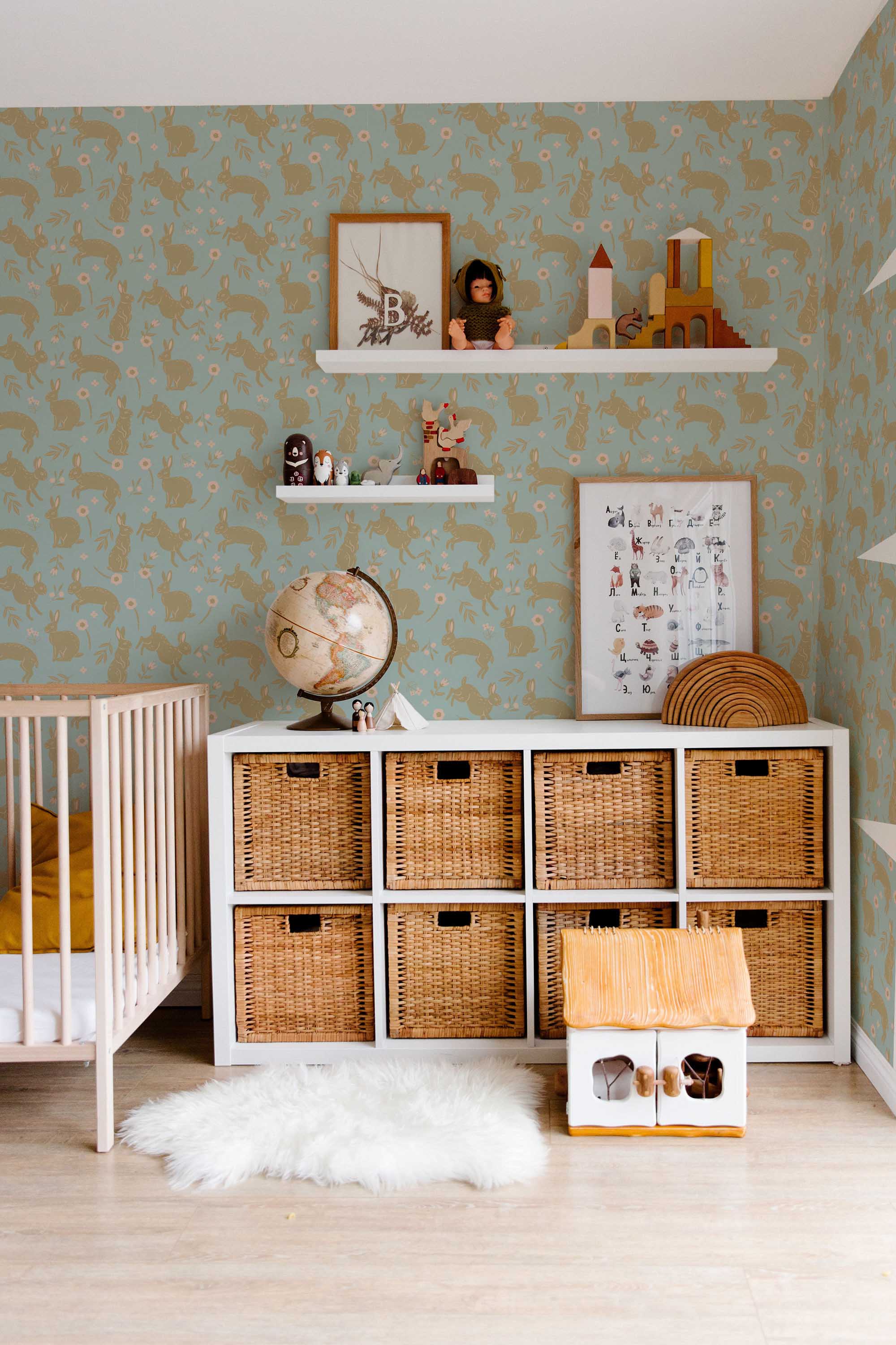 Fancy Walls peel and stick wallpaper featuring neutral boho bunnies in blue tones for a soft and modern nursery look.