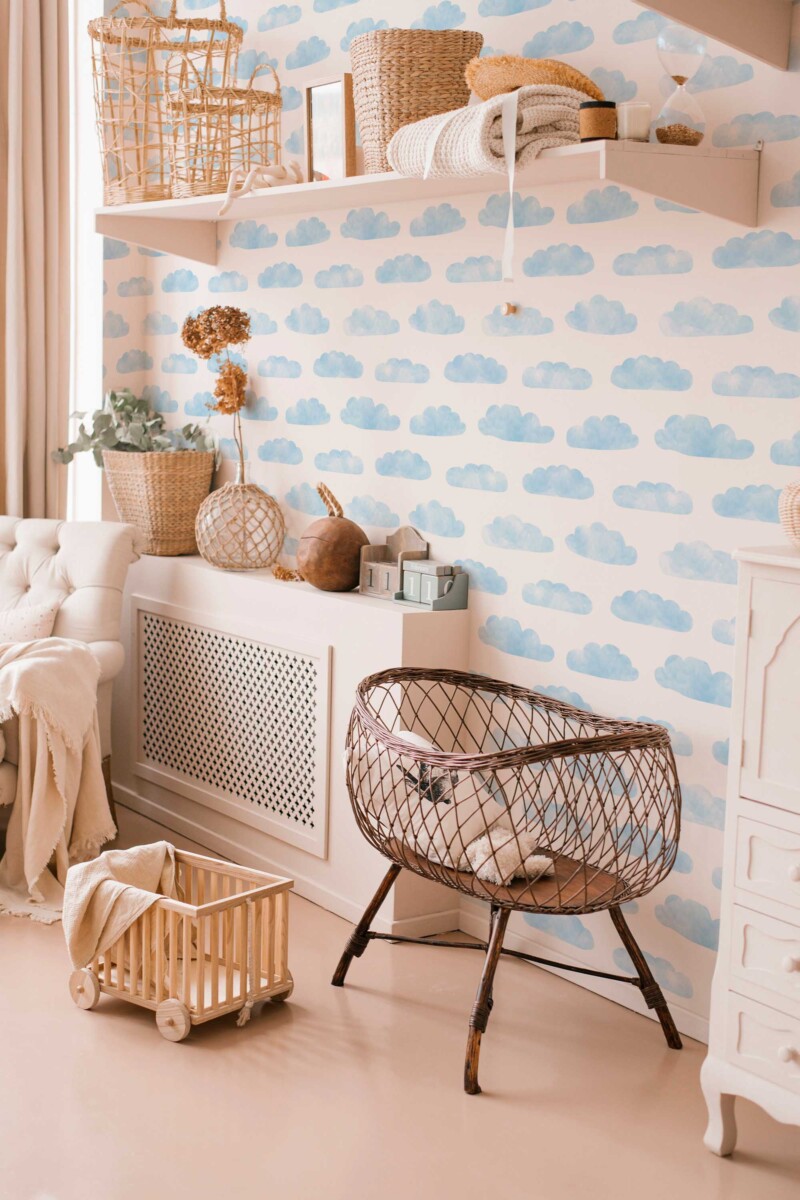 Fancy Walls peel and stick wallpaper featuring soft watercolor clouds in blue and white for a calming sky-themed interior.
