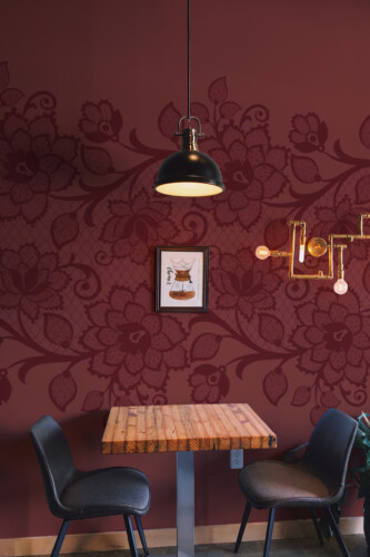 Fancy Walls Burgundy Floral Lace peel and stick wall mural featuring vintage floral lace motifs on a deep burgundy background.