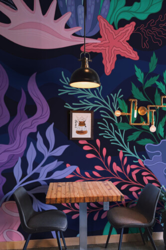 Fancy Walls Deep Sea Botanicals peel and stick wall mural with marine plants and coral details.