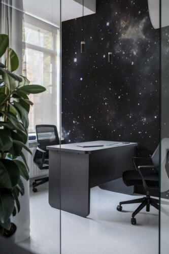 Fancy Walls Deep Space peel and stick wall mural featuring glowing constellations and cosmic clouds in dark galaxy tones.