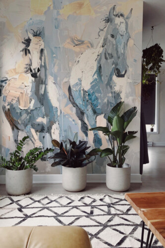 Fancy Walls Abstract Horse Elegance removable wall mural with galloping horses in light gray and cream hues.