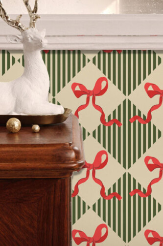 green and beige peel and stick wallpaper with red ribbons