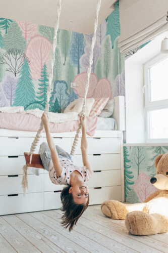 Pastel Woodland peel and stick wall mural with soft pastel forest trees for calm nursery décor.