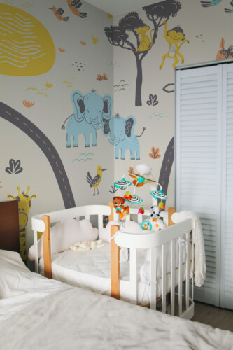 Safari Adventure peel and stick wall mural with cute jungle animals, perfect for playful nursery décor.