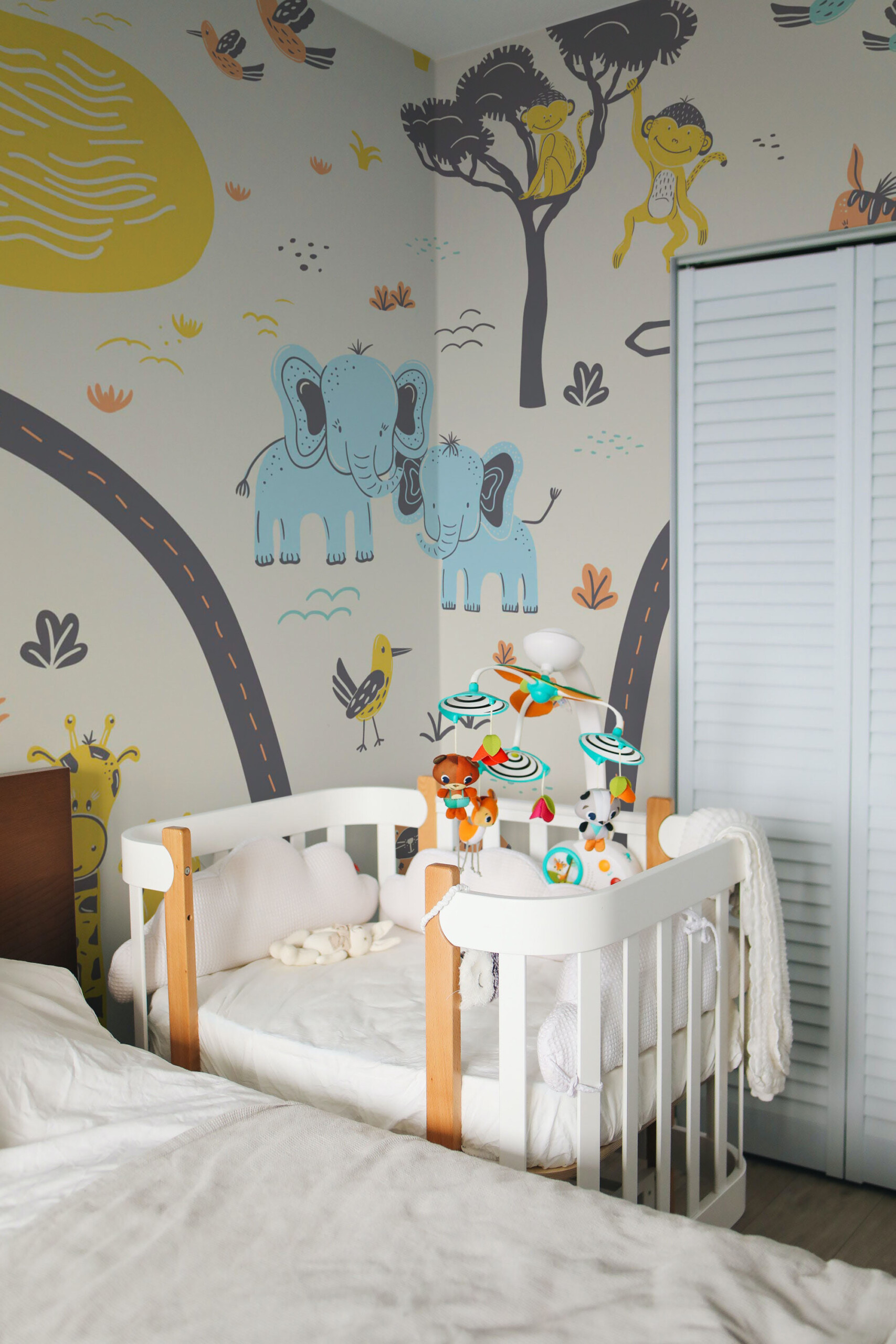 Safari Adventure peel and stick wall mural with cute jungle animals, perfect for playful nursery décor.