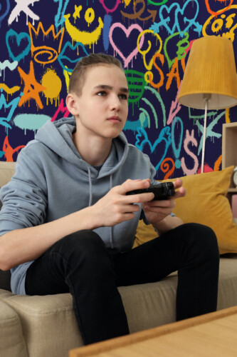 Fancy Walls Urban Pop Graffiti peel and stick wall mural featuring bold doodles, hearts, and vibrant dripping colors.