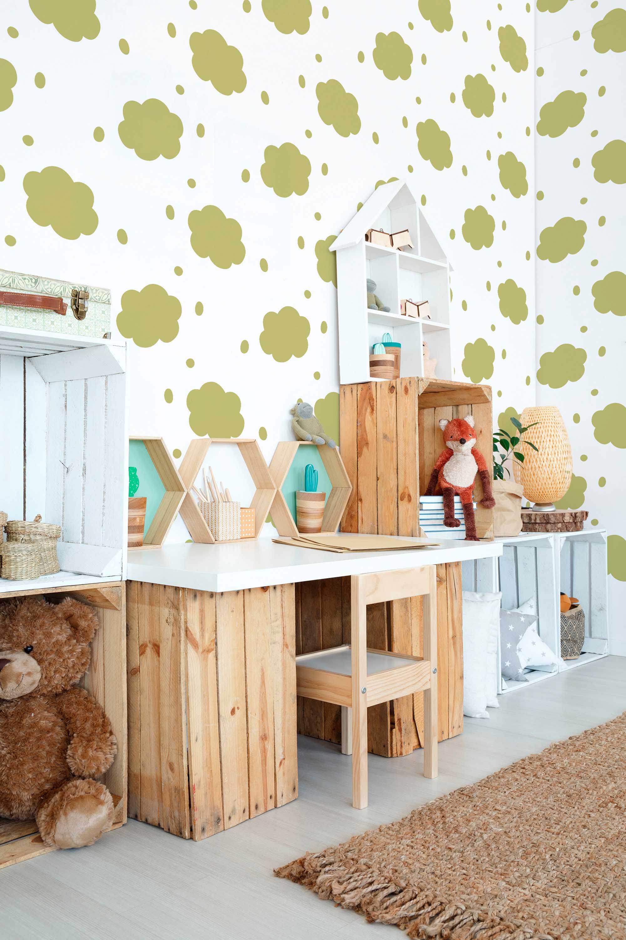Fancy Walls removable wallpaper featuring gentle olive cloud motifs ideal for a peaceful and minimalist baby nursery.