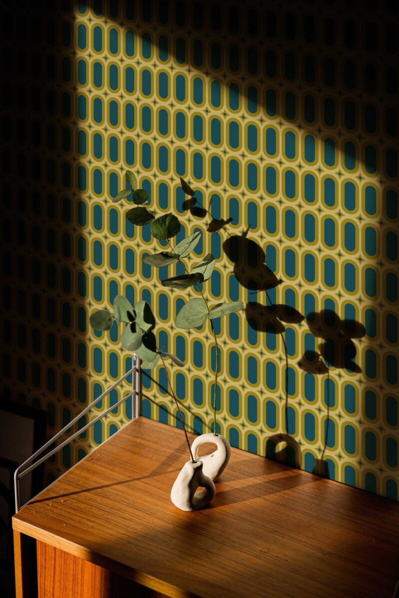 Fancy Walls traditional wallpaper featuring vintage olive green geometric ovals for a bold retro interior.