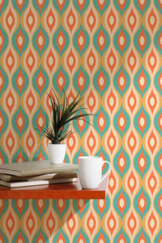 Fancy Walls self-adhesive wallpaper featuring lively mid-century style orange and green leaves.
