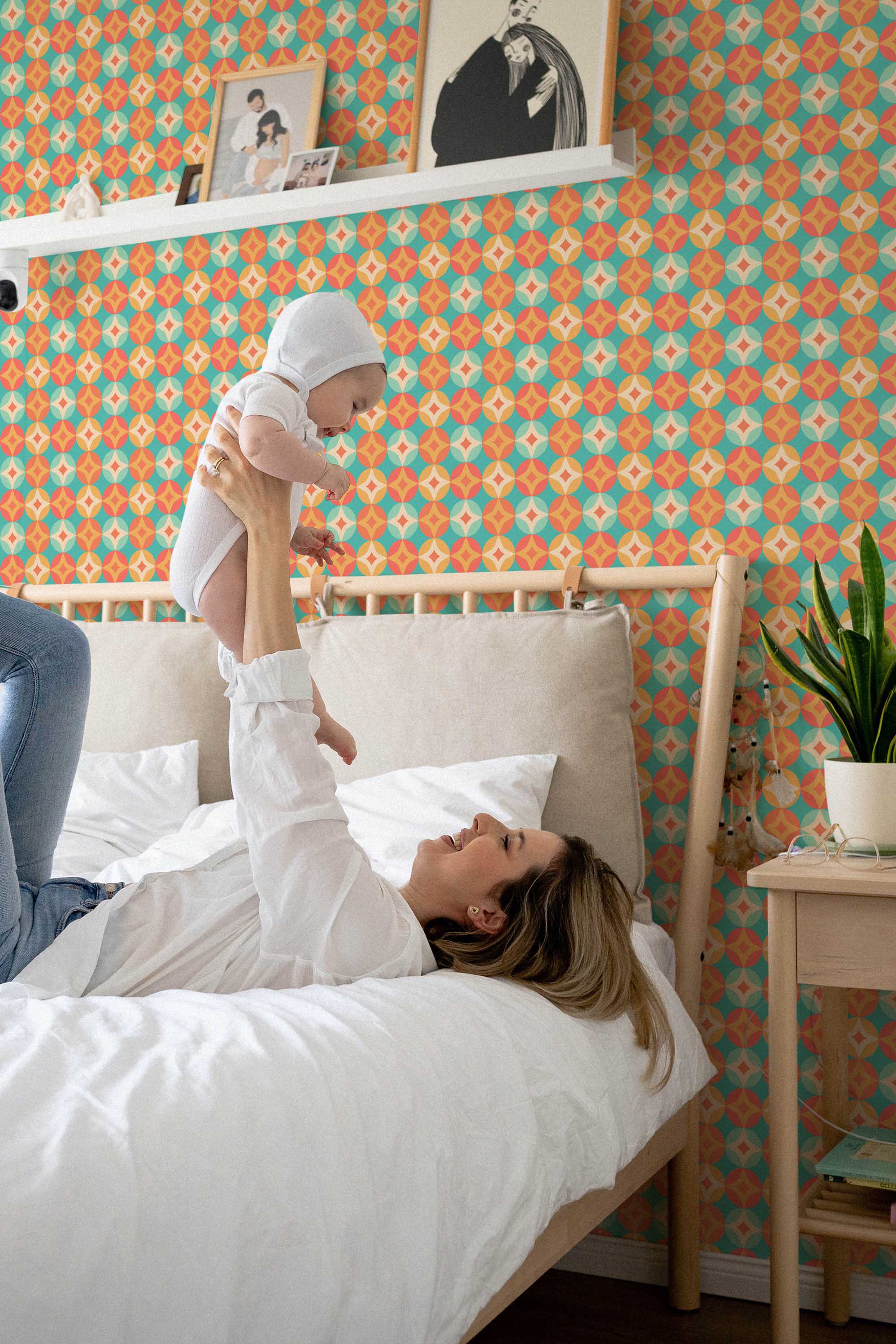 Fancy Walls traditional wallpaper with geometric orange mid-century inspired star motifs.