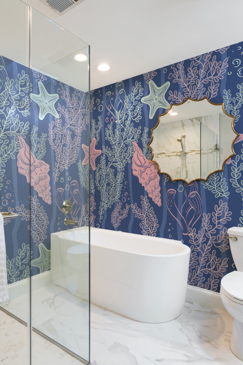 Fancy Walls Pastel Seashell Symphony peel and stick wall mural with seashells and starfish on navy blue.
