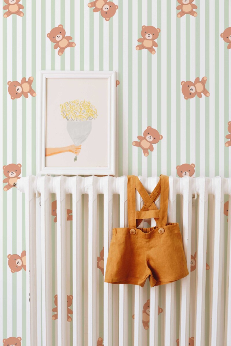 Fancy Walls traditional wallpaper featuring soft teddy bears on sage stripes creating a classic nursery atmosphere.