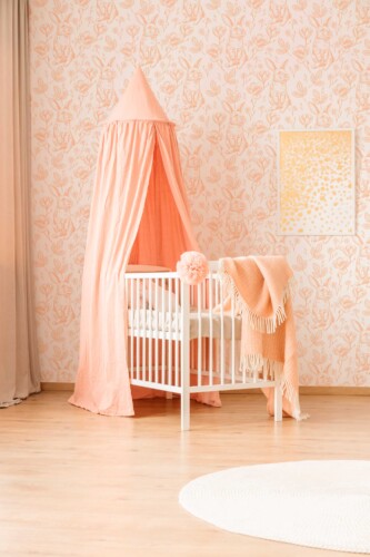 Fancy Walls peel and stick wallpaper featuring delicate peach vintage bunnies for a soft and whimsical nursery feel.
