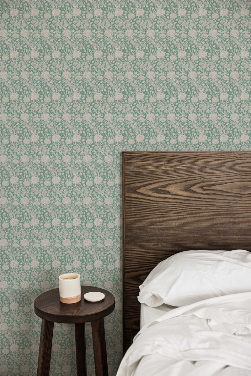 Fancy Walls peel and stick wallpaper with dense green Victorian floral pattern for richly decorated vintage interiors.