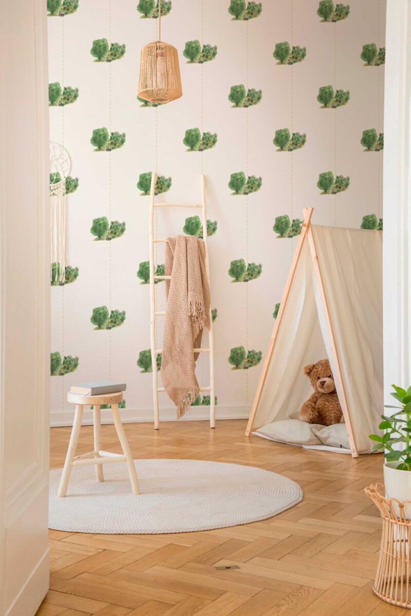 Fancy Walls peel and stick wallpaper featuring hand-painted green woodland trees for a fresh and calming nature-inspired room.