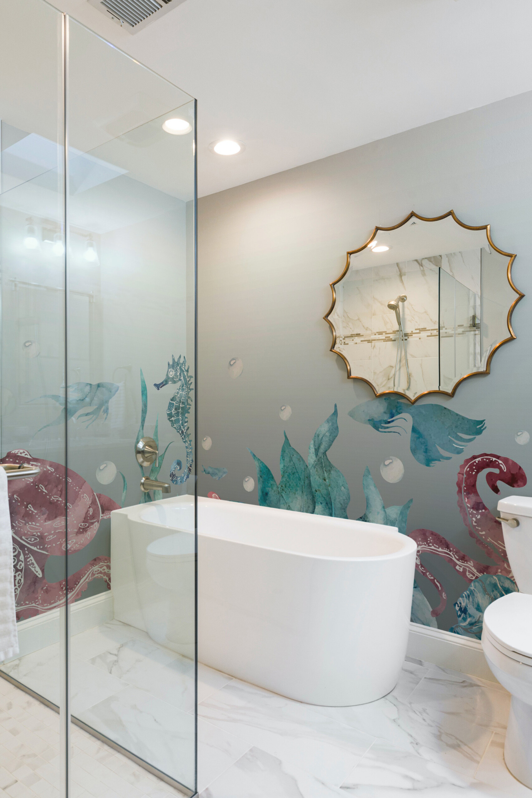 Fancy Walls Watercolor Ocean Dreams wall mural with sea creatures in gentle watercolor gradients.