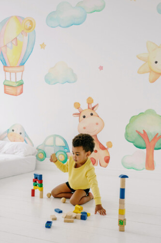Watercolor Toys peel and stick wall mural adds cheerful, pastel toyland charm to your baby’s nursery décor.