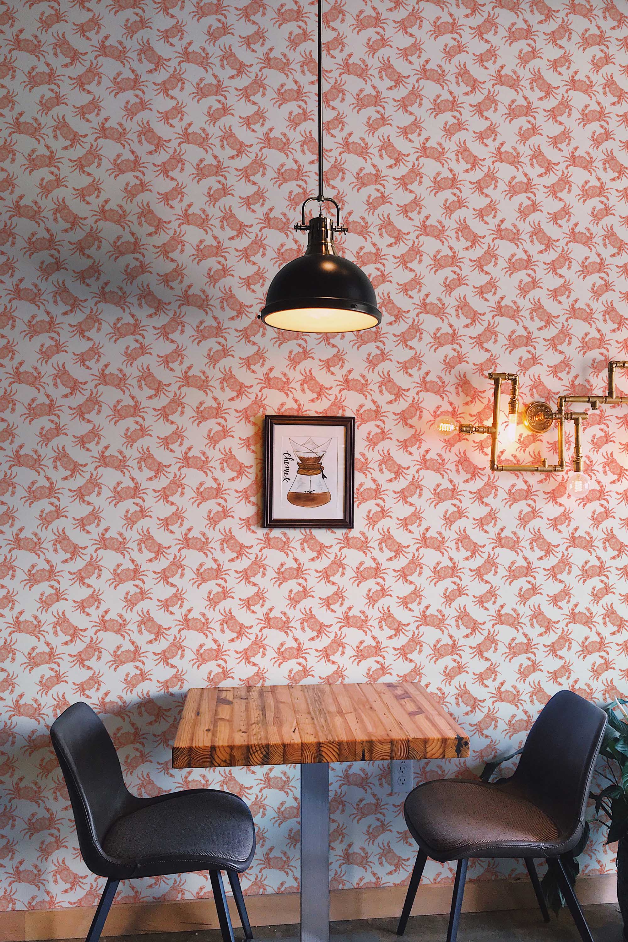 Fancy Walls peel and stick wallpaper with cute rust crayfish on a light beige background for a playful nautical interior.