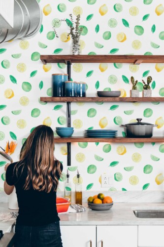 Fancy Walls traditional wallpaper inspired by classic citrus motifs painted in a soft watercolor style.