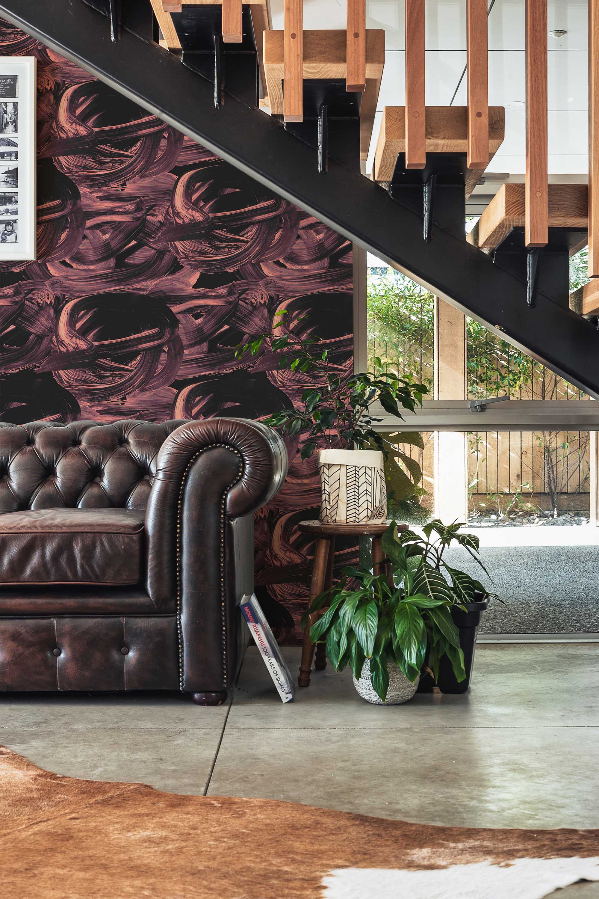 Fancy Walls self-adhesive wallpaper featuring maroon brush stroke patterns with rich artistic texture.