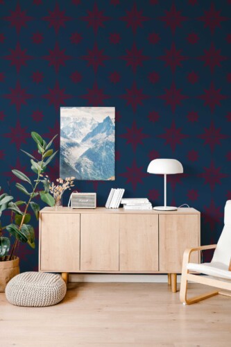 Fancy Walls traditional wallpaper inspired by classic retro star patterns in deep maroon tones.