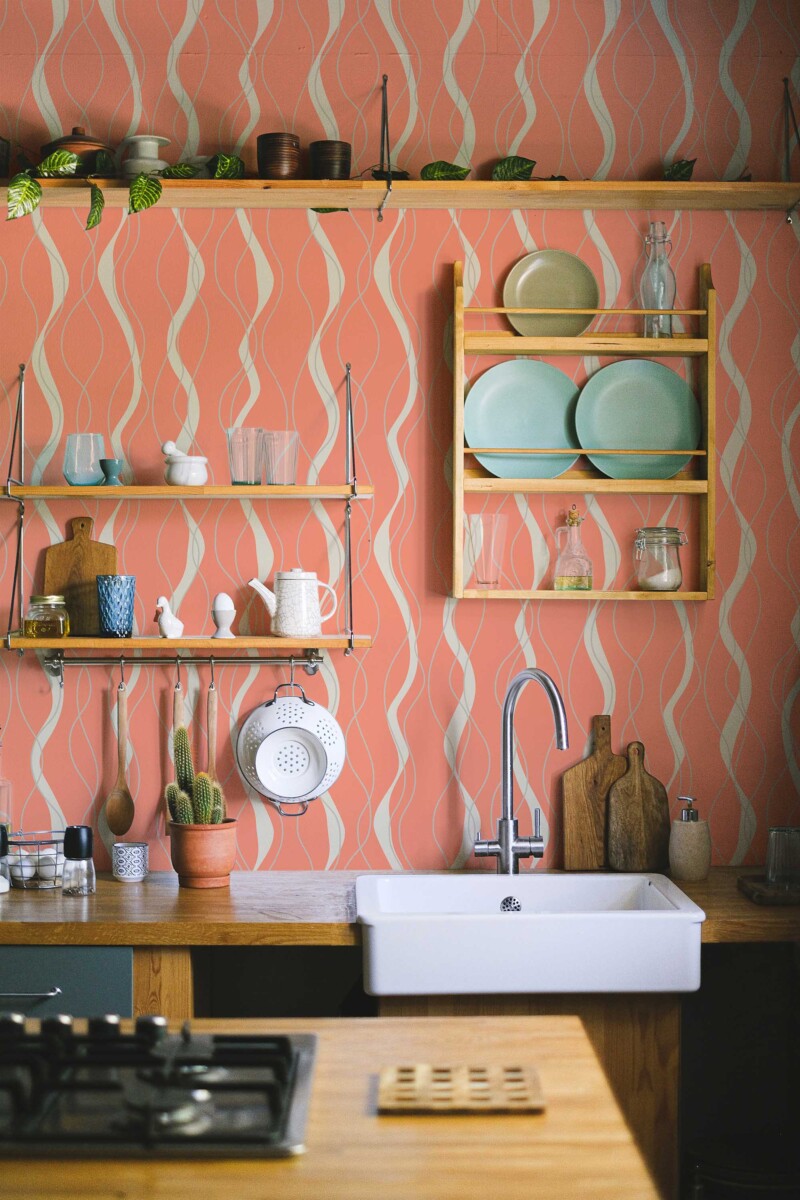 Fancy Walls artistic orange lines self-adhesive wallpaper for modern interiors with an organic abstract look.