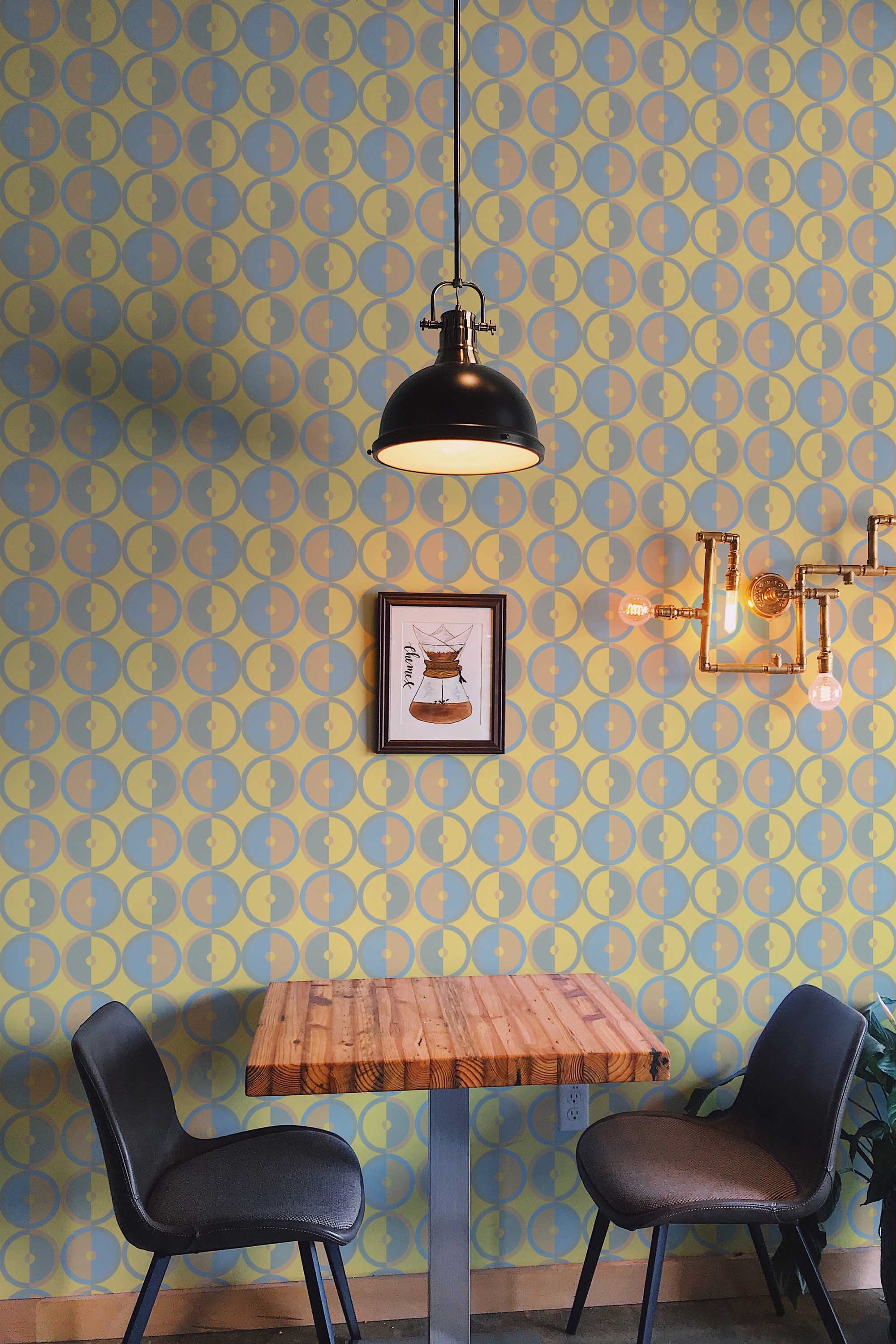 Fancy Walls playful 70s retro circles removable wallpaper with dynamic mustard yellow shapes.