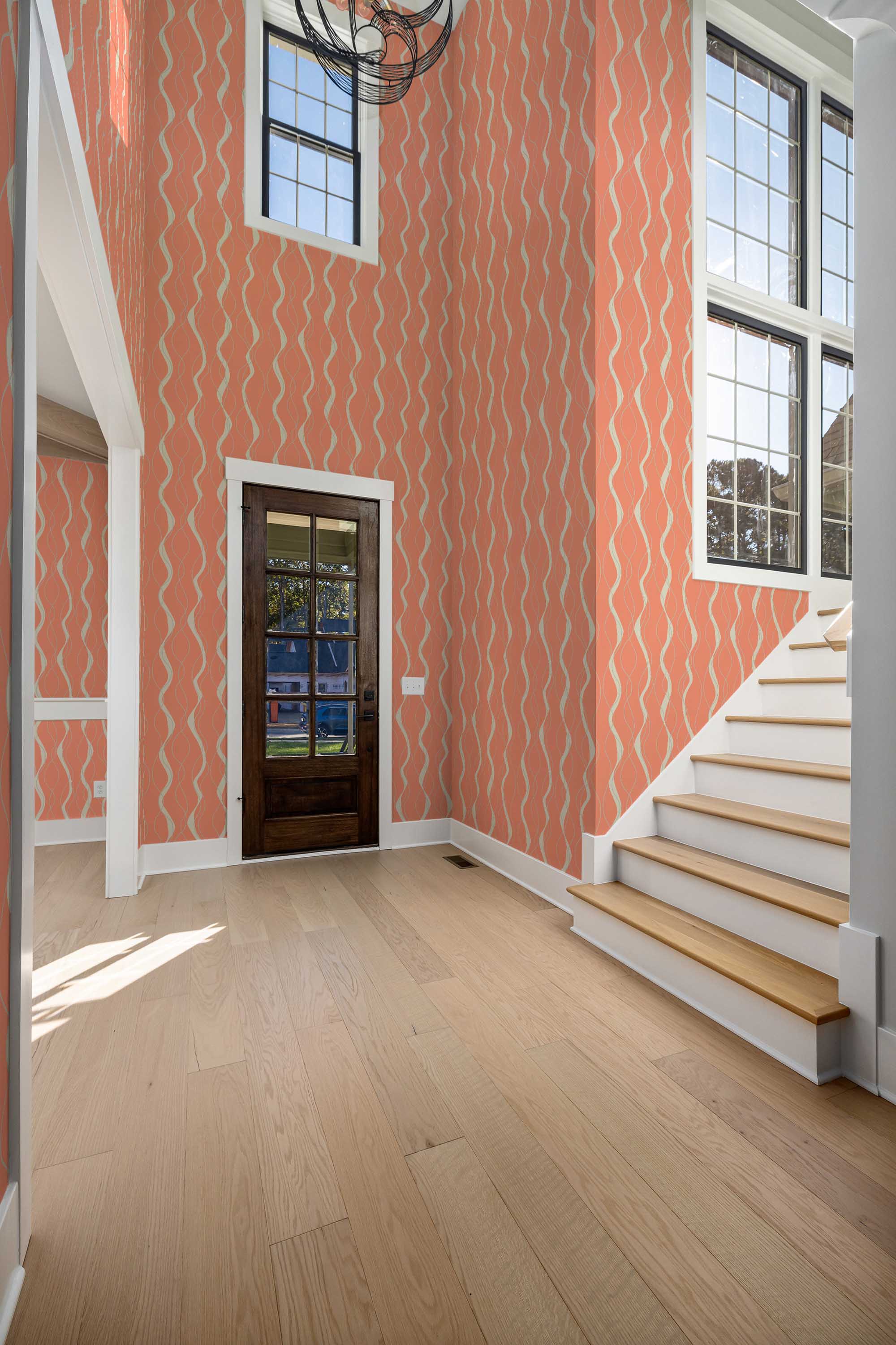 Fancy Walls flowing terracotta brush stroke removable wallpaper with a dynamic modern feel.