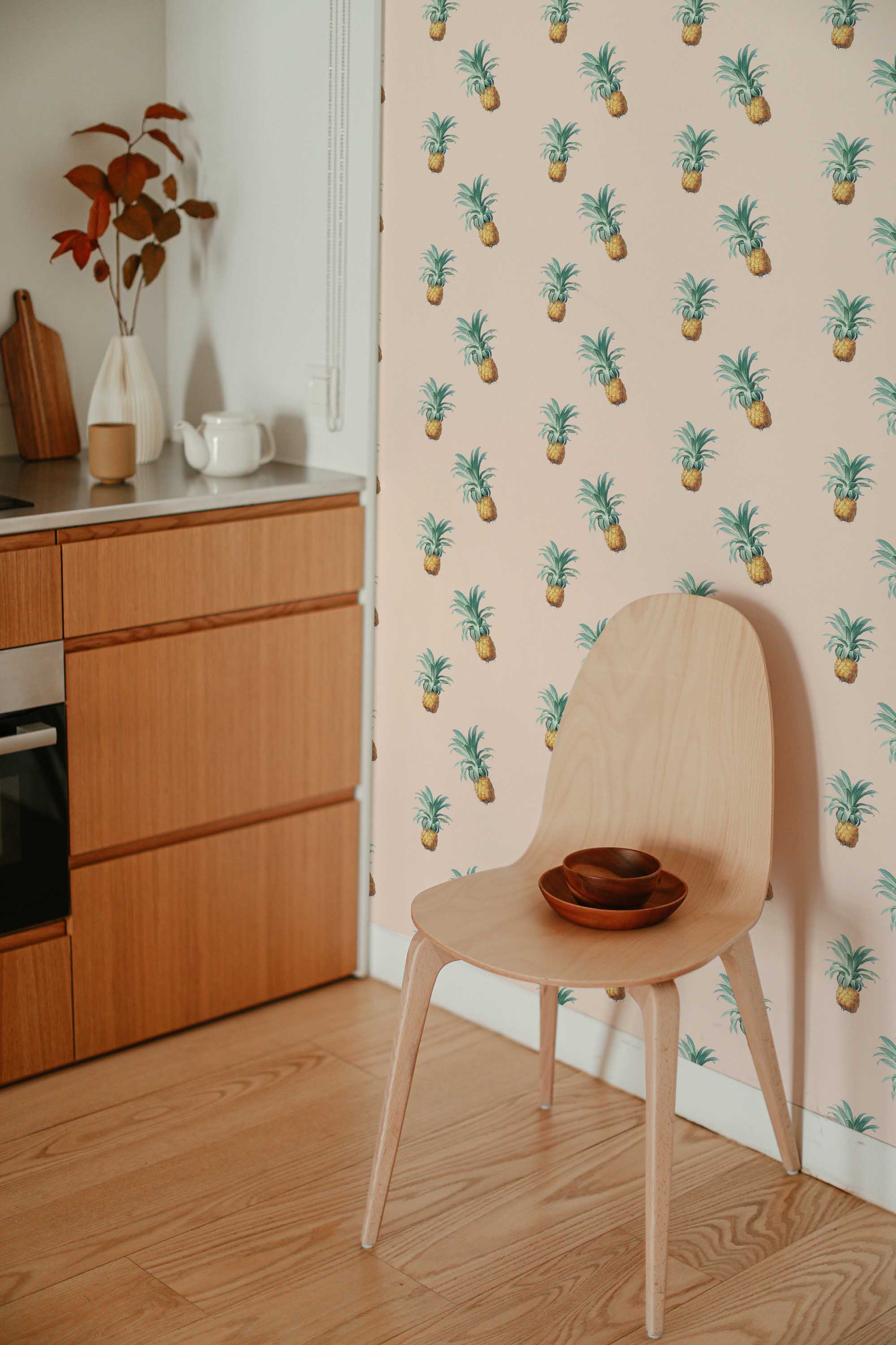 Fancy Walls removable wallpaper with tropical pineapple motifs for cheerful kitchens or dining spaces.