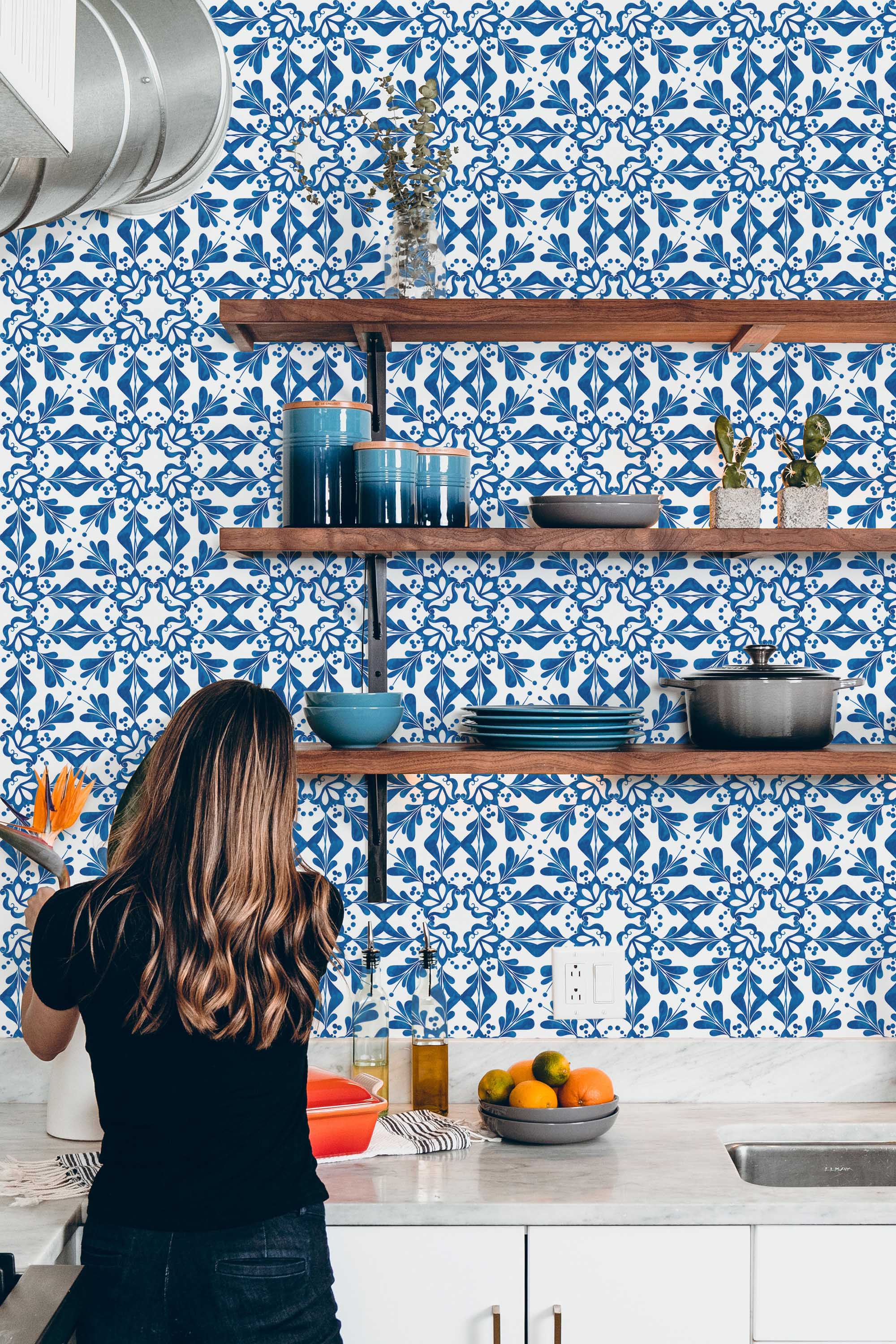 Fancy Walls peel and stick wallpaper with blue and white Portugese tile pattern for a classic decorative interior.