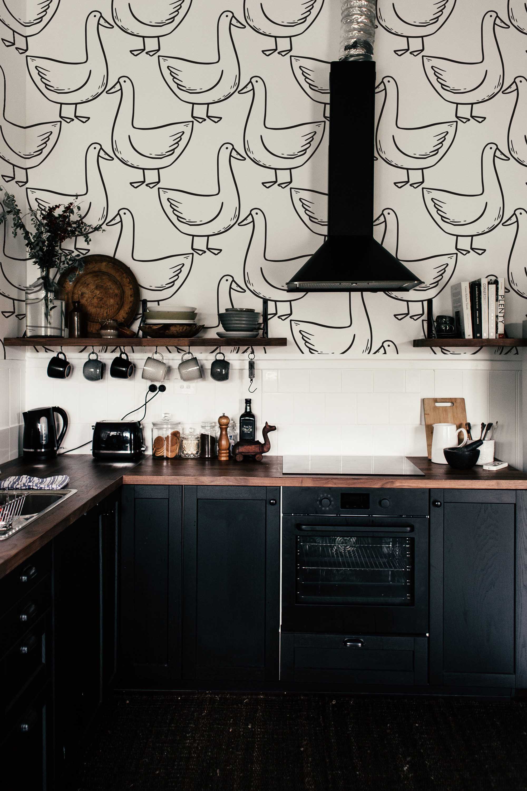 Fancy Walls peel and stick wallpaper with cute doodle goose pattern in black and white monochrome style