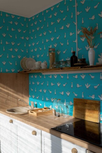Fancy Walls peel and stick wallpaper with flying geese on bright blue eclectic background