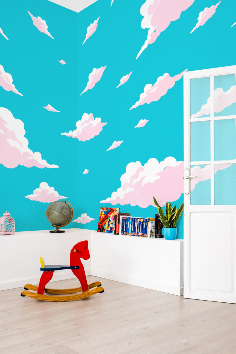 Fancy Walls peel and stick wall mural with pink anime clouds on blue sky for modern gaming rooms. Eco-friendly sky wallpaper mural.