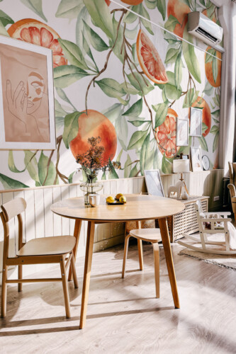 Fancy Walls removable wall mural with orange grapefruit branch pattern in watercolor style for tropical kitchens and coastal interiors.