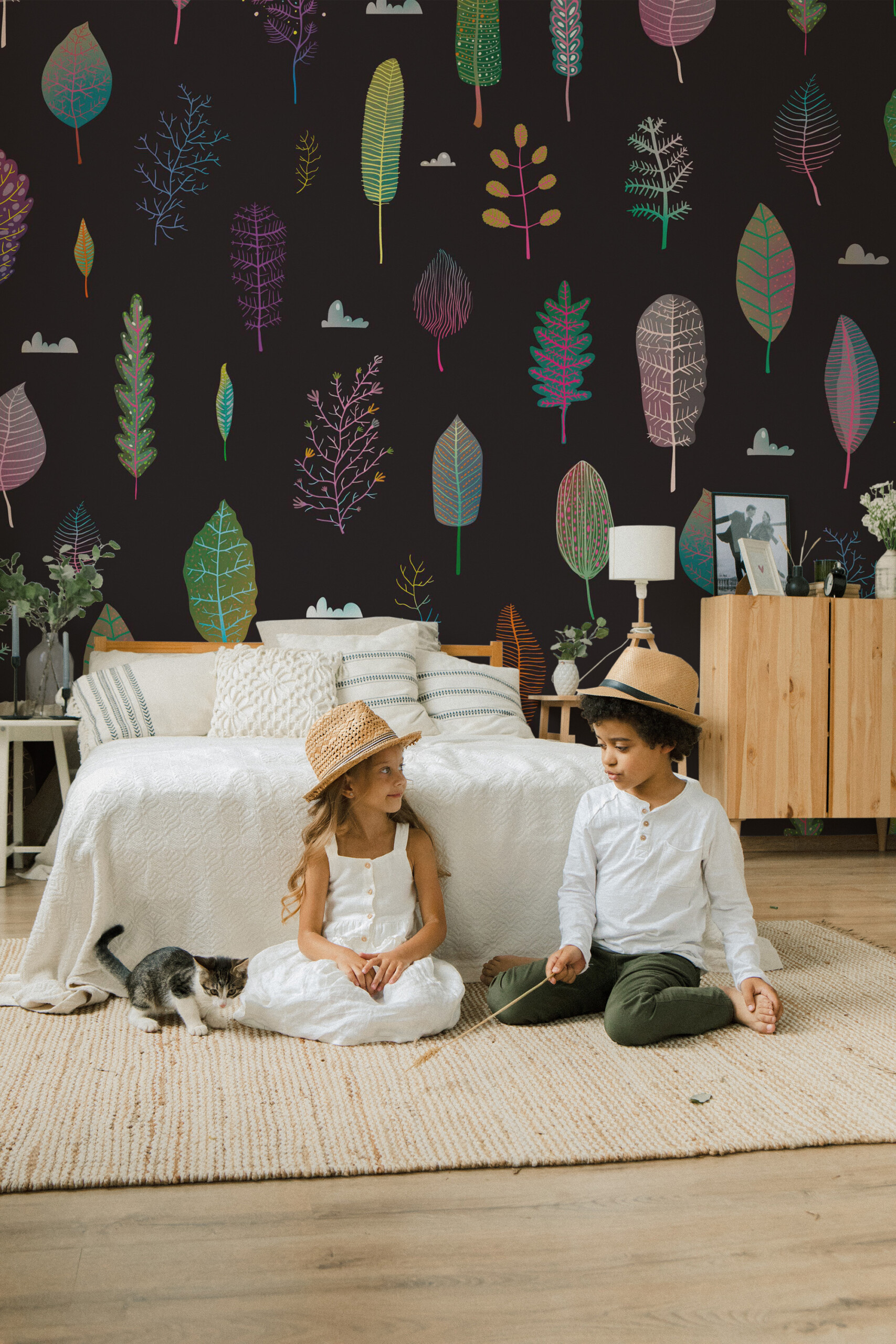 Fancy Walls traditional non-pasted eco-friendly wall mural featuring playful tree leaves on dark backdrop for fun & funky workspace décor.