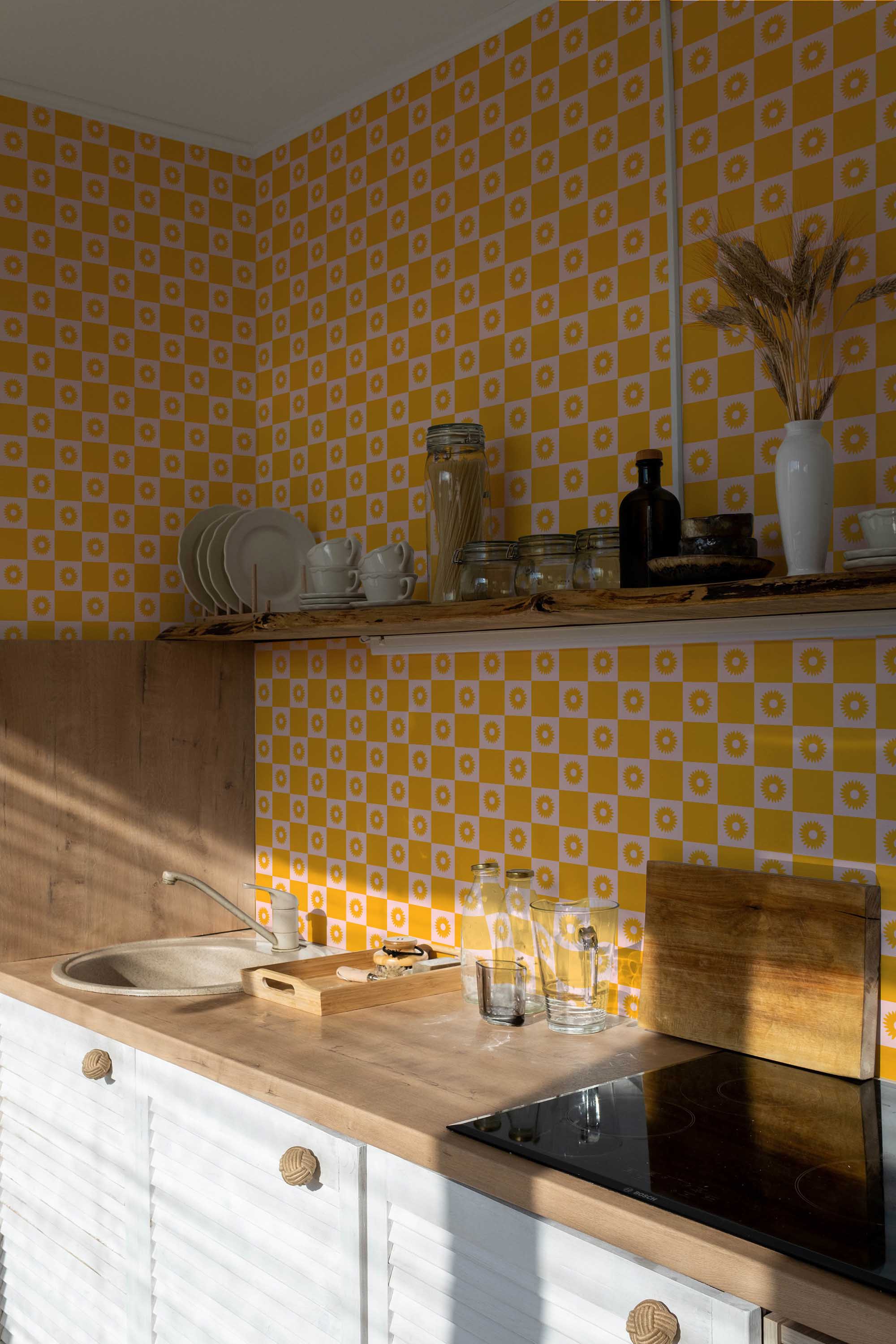 Fancy Walls traditional wallpaper with playful checkered sunflowers in warm mustard yellow palette