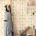 Fancy Walls traditional wallpaper highlighting classy goose motif in green with decorative bow