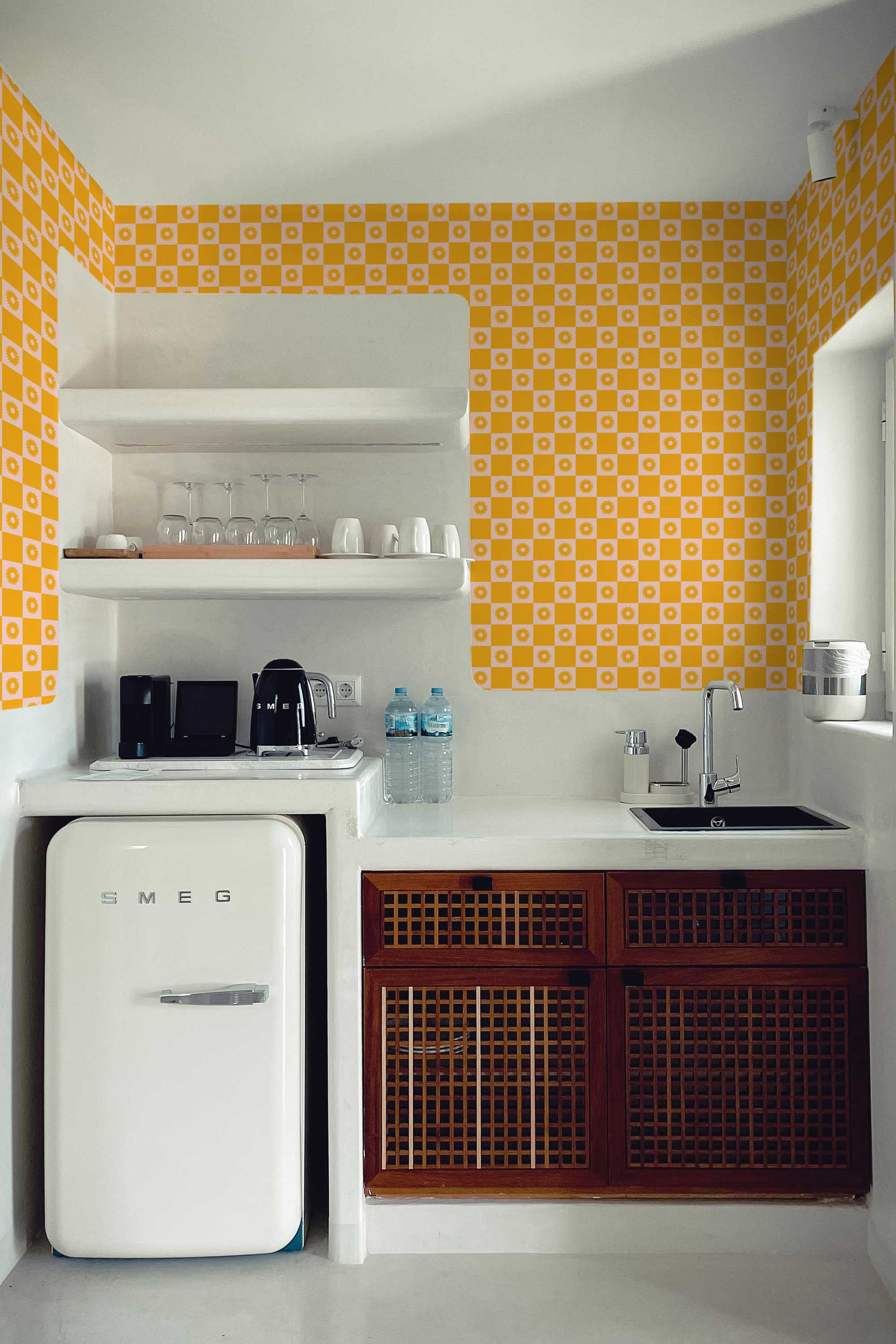 Fancy Walls peel and stick wallpaper with geometric checkered sunflowers in mustard yellow and pink fun pattern