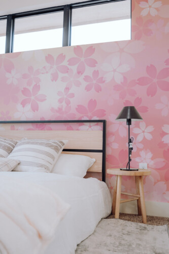 Fancy Walls removable wall mural with pastel ombre blossom pattern in soft tones for elegant feminine bedroom spaces.