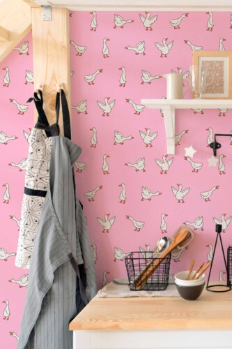 Fancy Walls self-adhesive wallpaper featuring uplifting pink geese in motion pattern