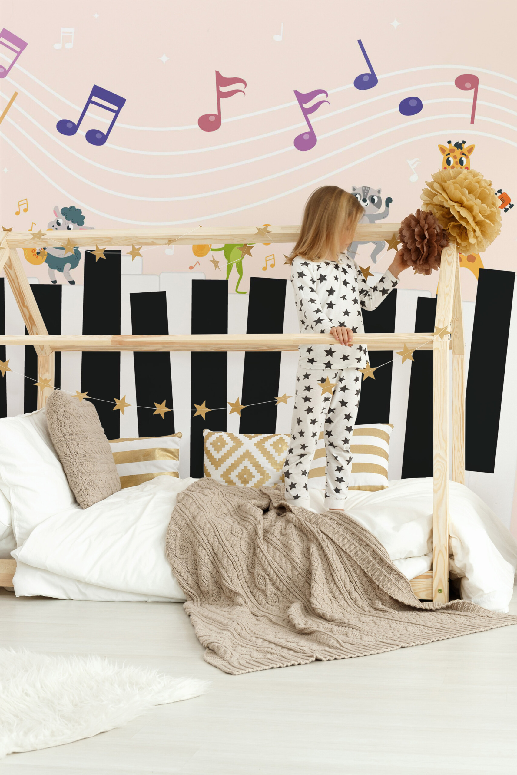 Fancy Walls peel and stick PVC-free wall mural with colorful dancing animals and piano theme for nursery and kids room décor.