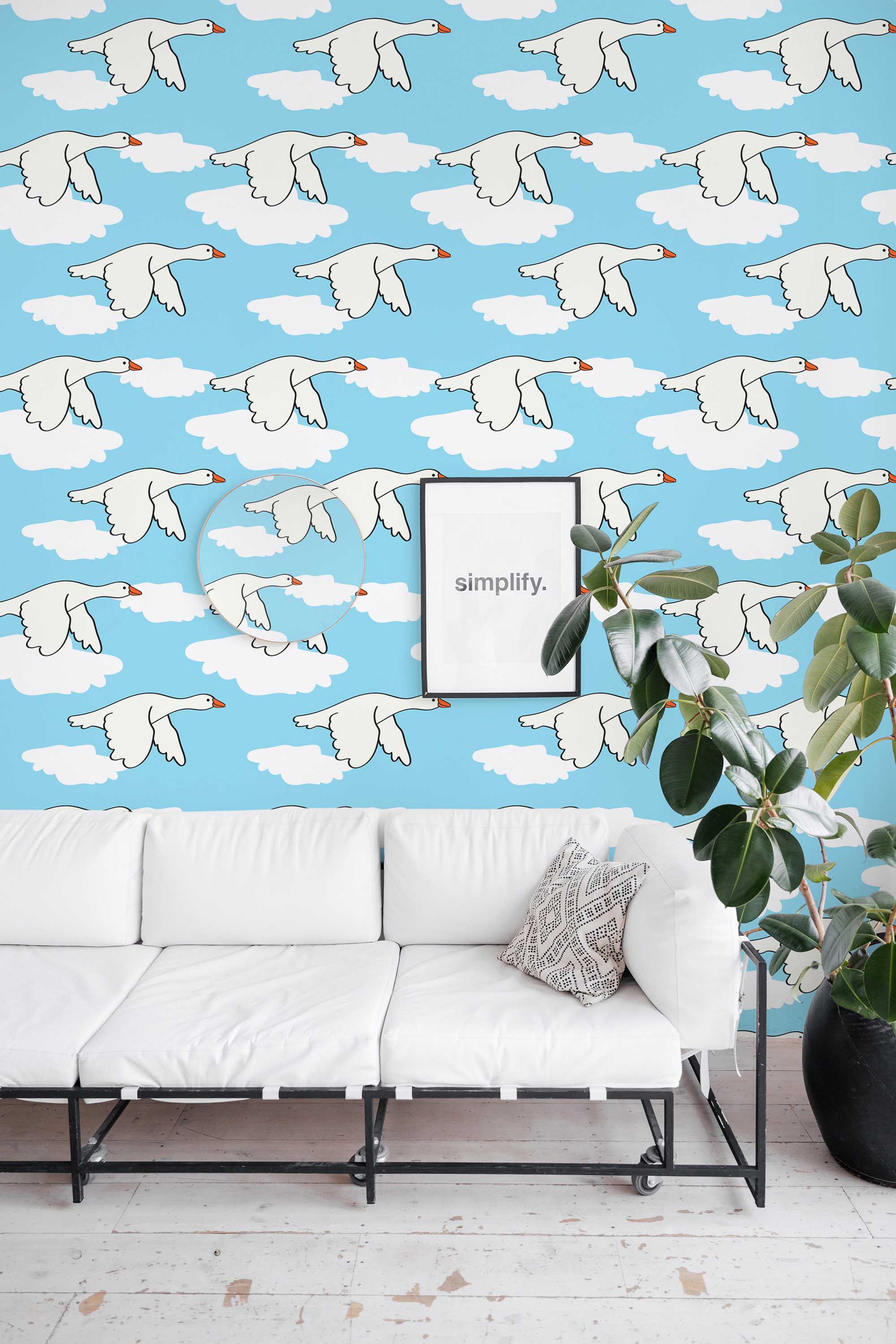 Fancy Walls removable wallpaper with minimalist smiling geese in blue and white palette