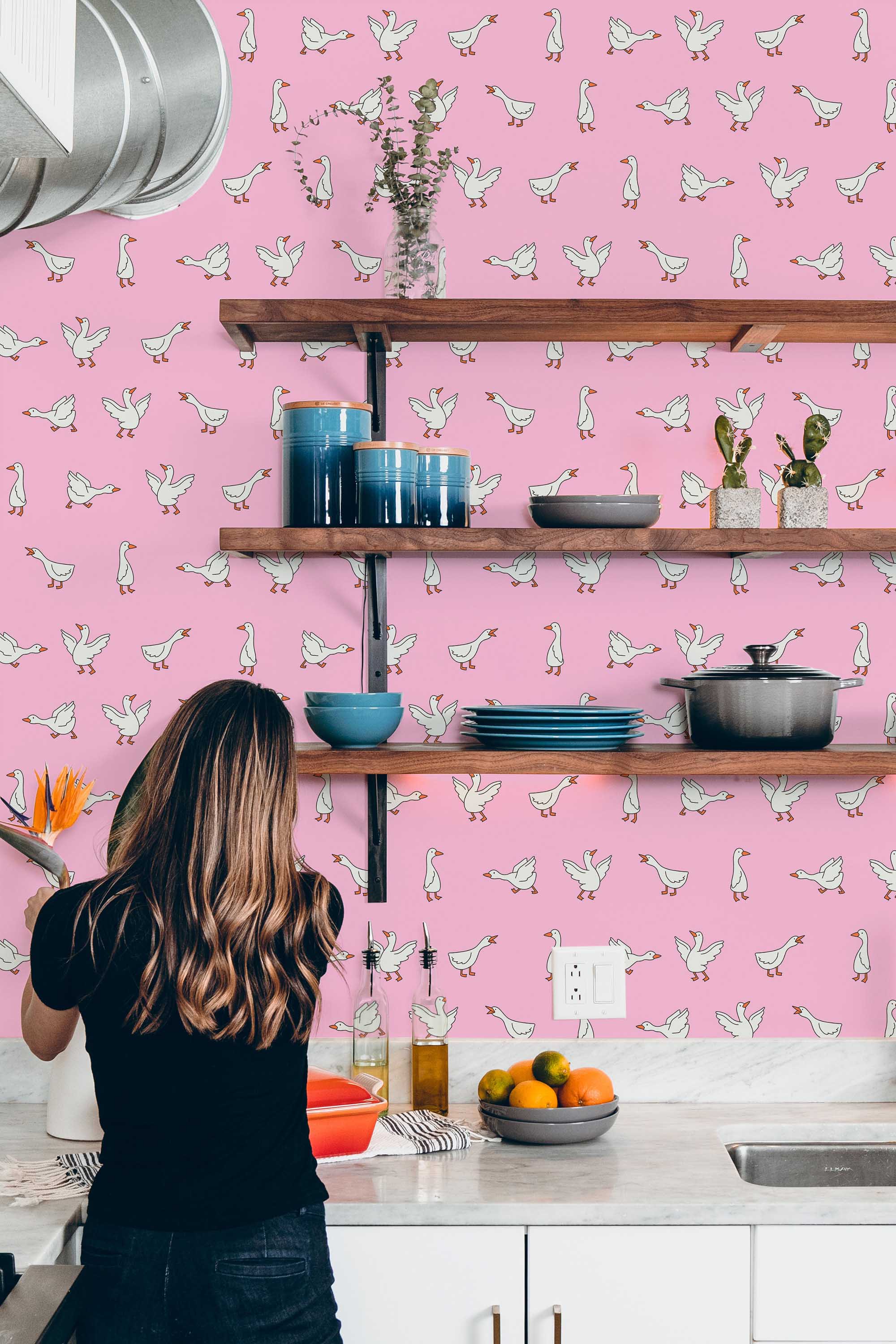 Fancy Walls peel and stick wallpaper with flying geese on bright pink eclectic background