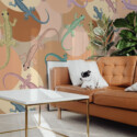 Fancy Walls Boho Lizard Party peel and stick PVC-free wall mural with colorful gecko pattern and warm boho circles for kids rooms and playful interiors.