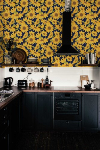 Fancy Walls wallpaper for walls with bright yellow sunflowers on midnight blue for eye catching feature walls