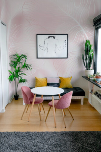 Fancy Walls Elegant Monstera Silk peel and stick PVC-free wall mural with line art monstera leaves on soft silk fabric imitation background for elegant bedrooms and modern interiors.