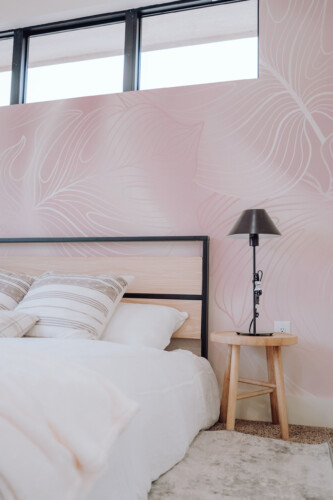 Fancy Walls Elegant Monstera Silk traditional non-pasted eco-friendly wall mural featuring blush monstera leaf outlines and smooth fabric-like texture for calm bedroom décor.