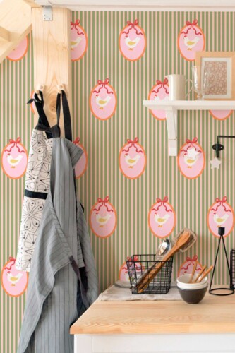 Self-adhesive wallpaper by Fancy Walls featuring cute green hens and soft stripes for relaxed country living spaces
